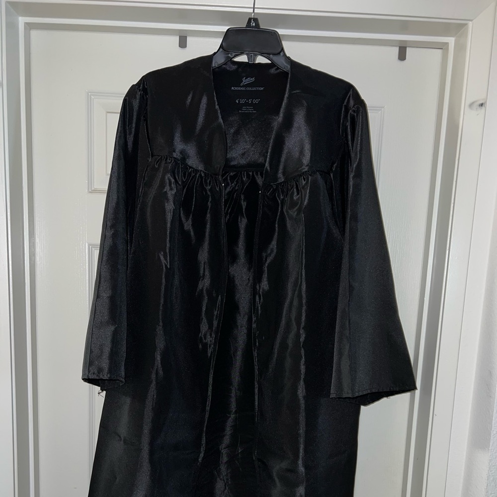 Academic regalia ( gown, cap, tassel 22)